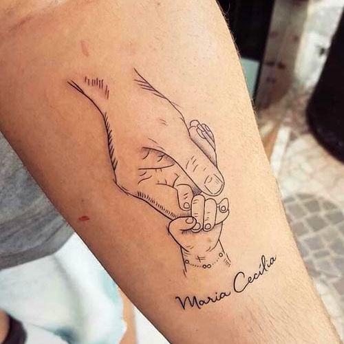 holding hand miscarriage tattoo for dad